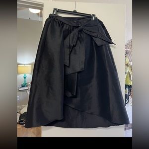 Black CeCe skirt with large bow asymmetrical bottom
